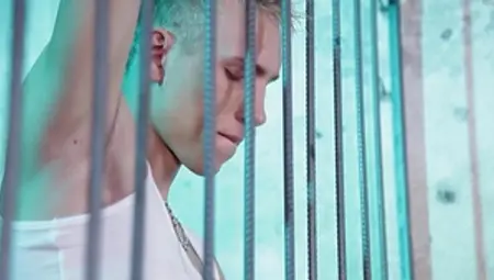 Young Blondie Sucks Guard's Leather-covered Cock